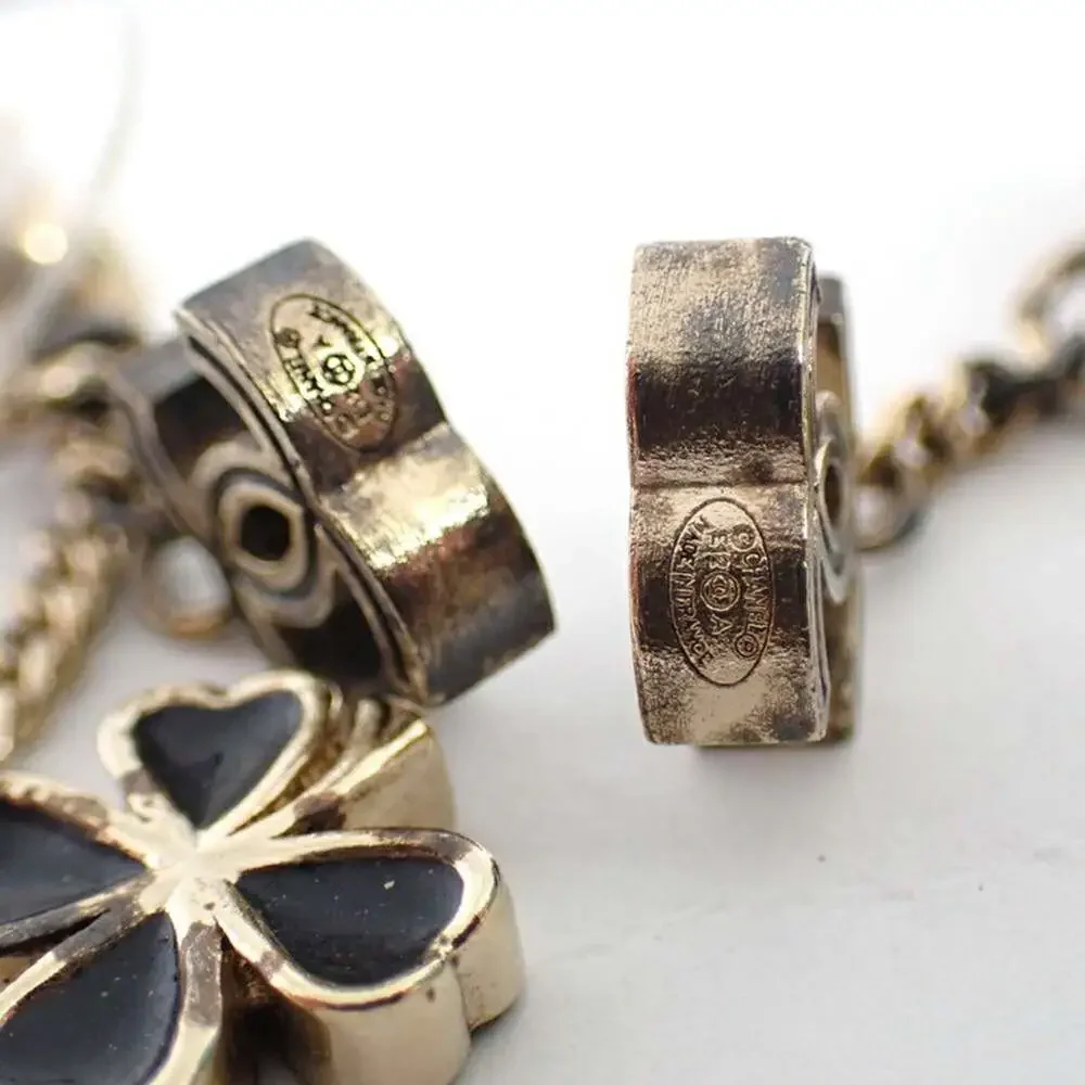 CHANEL Authentic Gold Logo Earrings